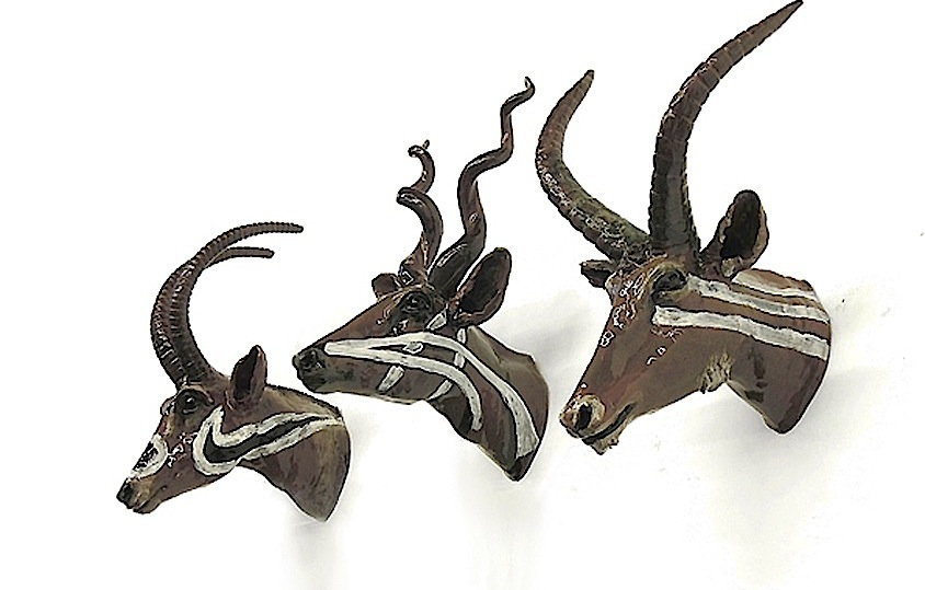 Rosi Steinbach: from the herd series [sneaker branding], 2012, ceramic, glazed, painted, each 45 x 30 x 30 cm

